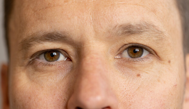 Close-up of man's eyes, focusing on facial expression and eye detail