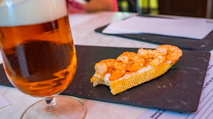 Grilled Prawns Typical Spanish Tapa and Beers at Restaurant Bar, Spain, Europe