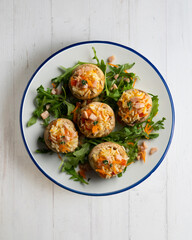 Mushrooms stuffed with rice and vegetables. Top view table.