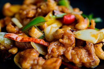 Thai food menu Close-up, stir-fried chicken and cashew nuts.