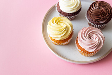 Cupcakes on a pink background. Dessert. Cooking. Baking. Vegetarian food.
