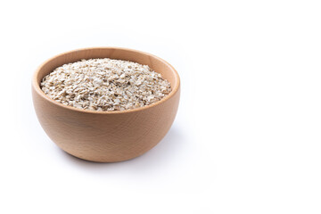 Rolled oats, healthy breakfast cereal oat flakes in bowl isolated on white background. Copy space