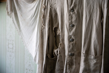 old ripped white clothing