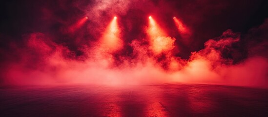Fototapeta premium Dramatic Red Stage Lighting with Fog and Smoke Effects in a Dark Theater Setting