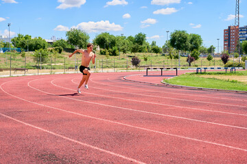 Sprinter running on curved track during training