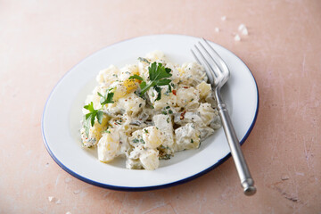 Homemade potato salad with pickles