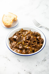 Beef ragout with pickled cucumber