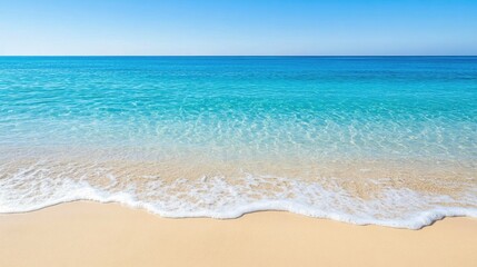 Fototapeta premium A serene beach scene with crystal clear turquoise water gently lapping at the soft, golden sand.