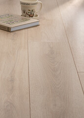 Elegant Beige Oak Laminate Flooring with Natural Woodgrain