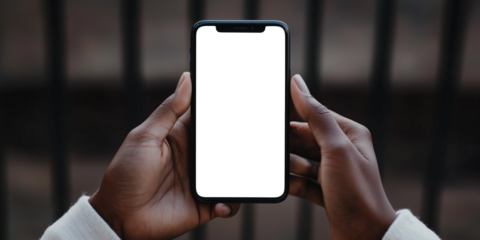 Mockup phone. Close-up photograph of hands holding a smartphone with a transparent screen. PNG image