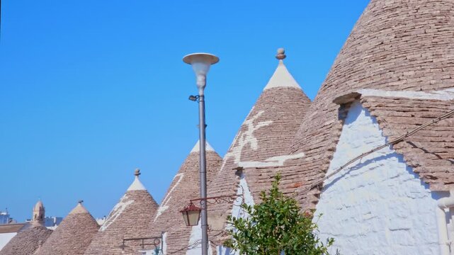 Details of the characteristic trulli of Alberobello, ancient dwellings made of stone and with the characteristic conical shape of the roofs. The trulli of Alberobello are a UNESCO heritage site.