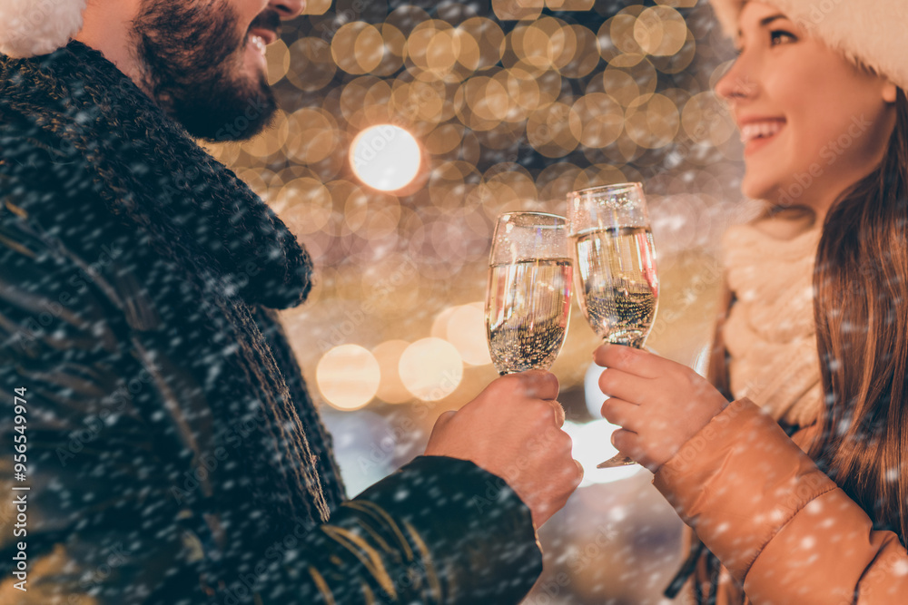 Canvas Prints Cropped photo of charming couple toast champagne alcohol glass newyear congratulation outdoors on evening x-mas street