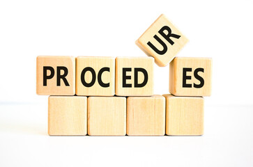 Procedures symbol. Concept word Procedures on beautiful wooden blocks. Beautiful white background. Business procedures concept. Copy space.