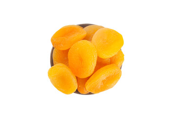 Bowl with dried apricots on table 