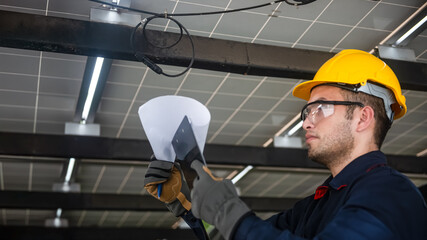 Engineer technical service checking installation solar cell panel and check all the lists on...