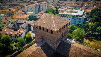 Tower of the Visconti castle of Pavia seen from a drone. famous monument and historical cultural heritage located in the city of Pavia, Italy.