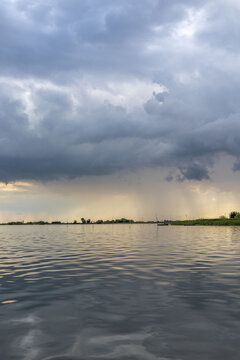 Clouds and rain over the river