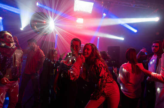 People dancing in night club during DJ Solovey birthday party