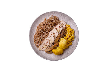 Asian dish with sliced chicken fillet, buckwheat noodles, soy sauce