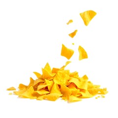 Fototapeta premium Pile tortilla chips crumbs, yellow pieces flying isolated on white background high saturation