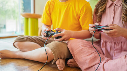 Two people playing a video game together