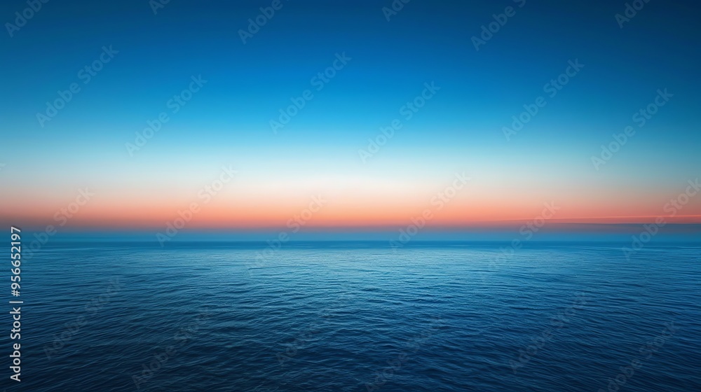 Poster A beautiful blue ocean with a pink and blue sunset sky.