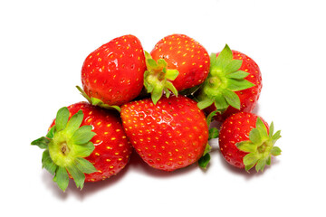 Group of ripe and juicy strawberries isolated on a white background