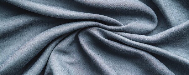 Fototapeta premium Close-up of luxurious soft fabric with elegant folds and a soothing blue hue, perfect for various design projects.