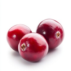 Obraz premium Fresh cranberries on a white background showcasing their vibrant red color and smooth texture
