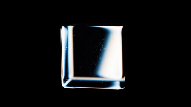 3D animation of geometric shapes with dispersion rainbow color spectrum prism effect on isolated black background