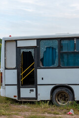 Broken glass in the bus. Shooting, bullet hole concept. High quality photo.