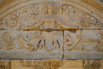 Detail of the Temple of Hadrian in the ruins of the Ancient City of Ephesus in Selcuk, Turkey.