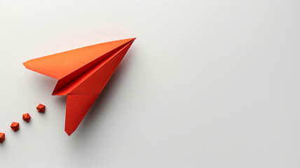 Naklejka premium Red paper airplane flies close-up
