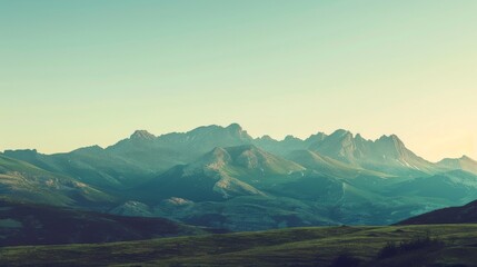 Fototapeta premium Serene mountain landscape with a clear sky