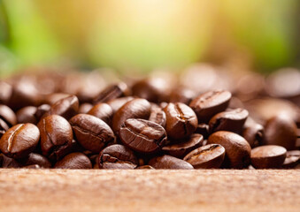 Obraz premium Close-up of Roasted Coffee Beans on a Wooden Surface