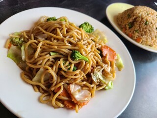 Asian Stir-Fried Noodles and Fried Rice Eye-Level View