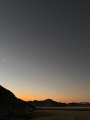 sunset in the desert mountains