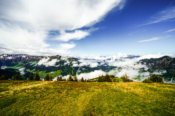 View from Schatzberg of the surrounding landscape. Idyllic nature in Wildschönau in the Kufstein district in Austria. Mountain landscape in the Kitzbühel Alps in Tyrol.
