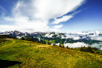 Fototapeta premium View from Schatzberg of the surrounding landscape. Idyllic nature in Wildschönau in the Kufstein district in Austria. Mountain landscape in the Kitzbühel Alps in Tyrol. 