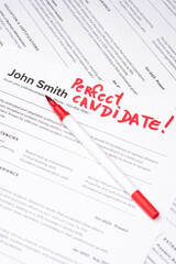 Obraz premium Fake mock CV (curriculum vitae) resume for John Smith, selected by HR as the perfect candidate for a job. Concept of job search, employee selection, recruitment process, work and hiring.