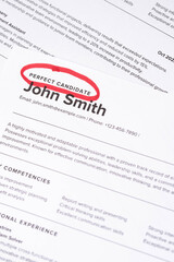 Obraz premium Fake mock CV (curriculum vitae) resume for John Smith, selected by HR as the perfect candidate for a job. Concept of job search, employee selection, recruitment process, work and hiring.