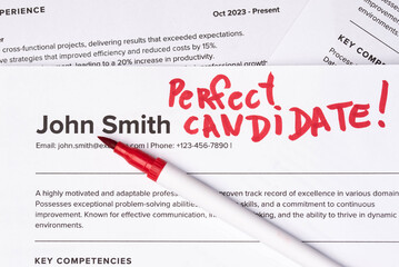 Obraz premium Fake mock CV (curriculum vitae) resume for John Smith, selected by HR as the perfect candidate for a job. Concept of job search, employee selection, recruitment process, work and hiring.