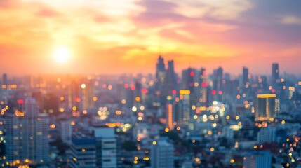 Fototapeta premium A blurred city skyline at sunset, showcasing a vibrant urban landscape filled with lights and colors.