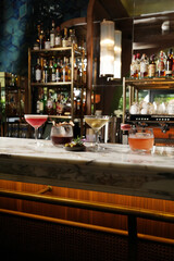 Set of various cocktails on bar counter. Assortment of alcoholic cocktails on restaurant bar