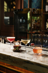 Set of various cocktails on bar counter. Assortment of alcoholic cocktails on restaurant bar