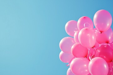 Pink satin ribbon on blue background. Fight against breast cancer. Copy space