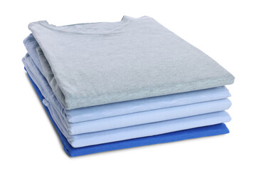 Stack of clean colorful t-shirts isolated on white