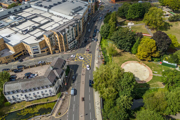 Naklejka premium Aerial drone shot over cars driving on the road in Bishops Stortford in England
