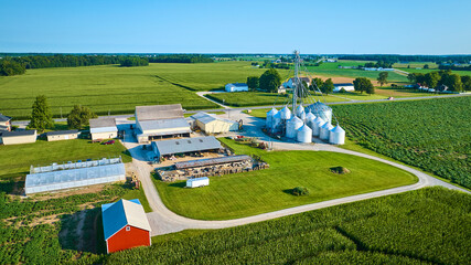 Aerial View of Cornfields and Red Barn with Grain Silos © Nicholas J. Klein