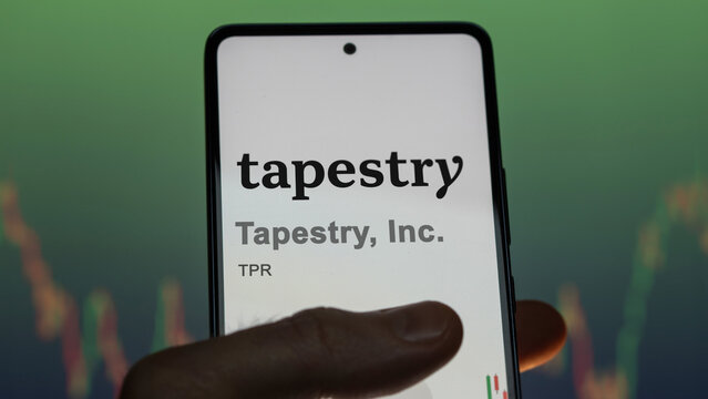 April 09th 2024 , New York City, New York. Close up on logo of Tapestry, Inc. on the screen of an exchange. Tapestry, Inc  price stocks, $TPR on a device.